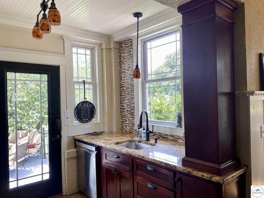 Step Back In Time and embrace the elegance of history in this - photo 21