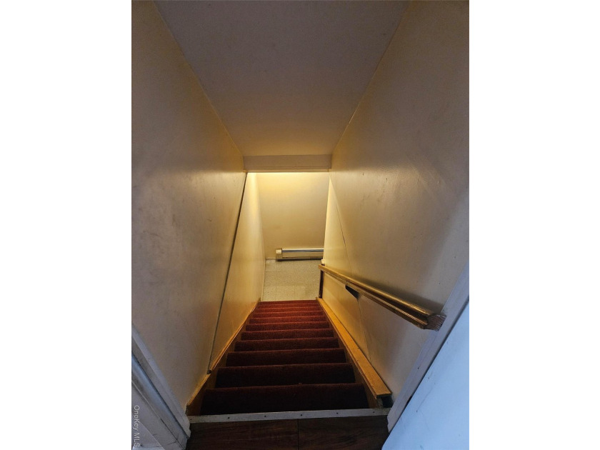 Nicely maintained 2 family home with wood floors. 1st floor has - photo 31