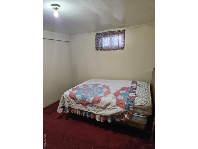 Nicely maintained 2 family home with wood floors. 1st floor has - photo 34