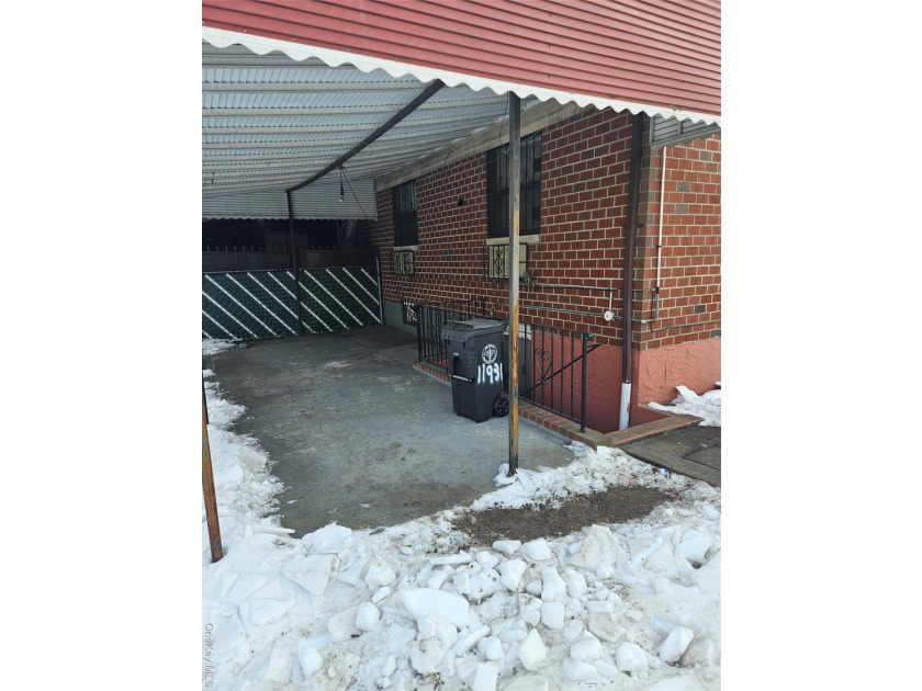 Nicely maintained 2 family home with wood floors. 1st floor has - photo 40