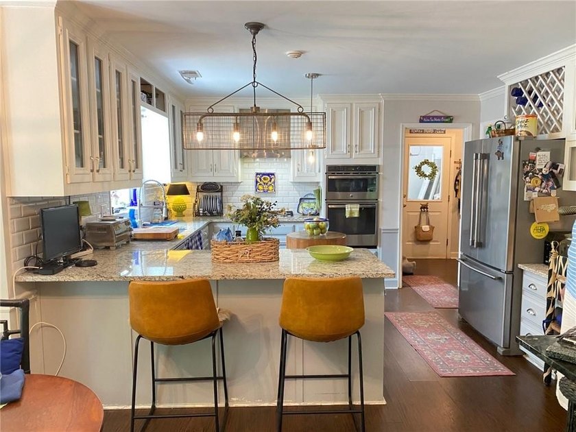Welcome home to this beautifully maintained residence featuring - photo 7