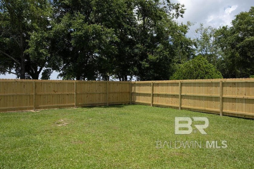 Are you looking for a low-maintenance home that is convenient to - photo 4