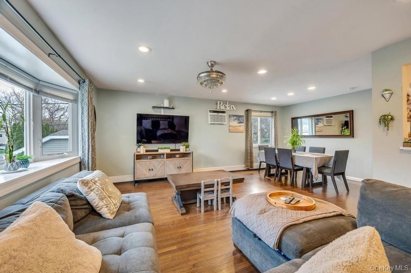Welcome to this beautifully updated Hi-Ranch located in the - photo 4