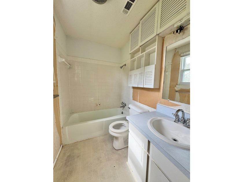 Welcome to this solidly built 3-bedroom, 2-bath home nestled on - photo 16