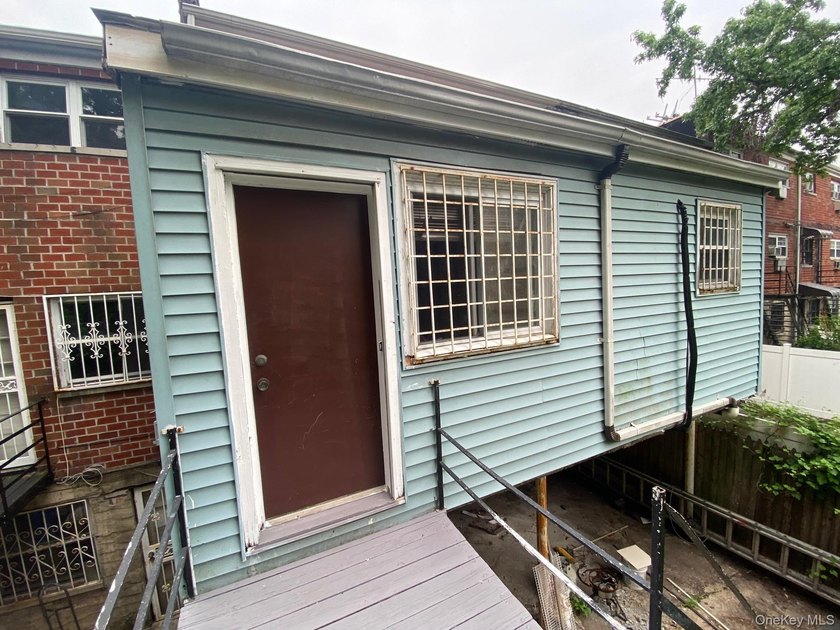 Baychester Area Updated 2 Family Brick attached Home with a - photo 33