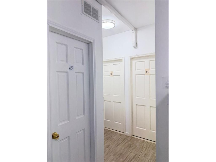 Welcome to this 2-family brick house located in Sunset Park. The - photo 3