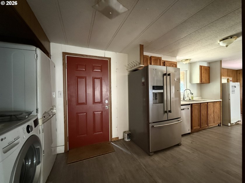 This spacious 1,800+ square foot manufactured home offers an - photo 11