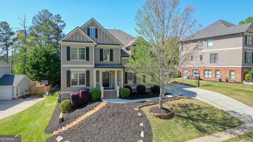 Welcome home to this move-in-ready 5BR/4BA custom home in the - photo 2