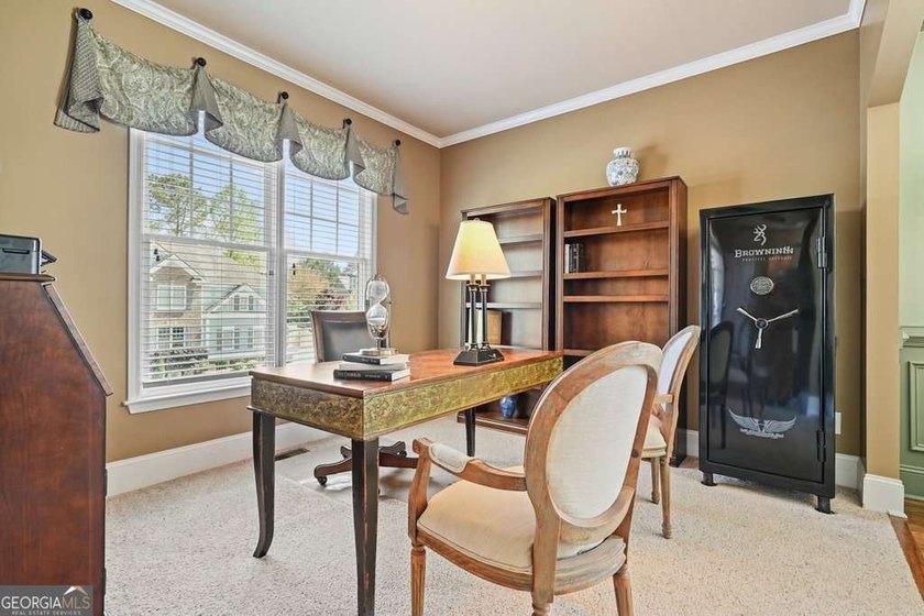 Welcome home to this move-in-ready 5BR/4BA custom home in the - photo 4