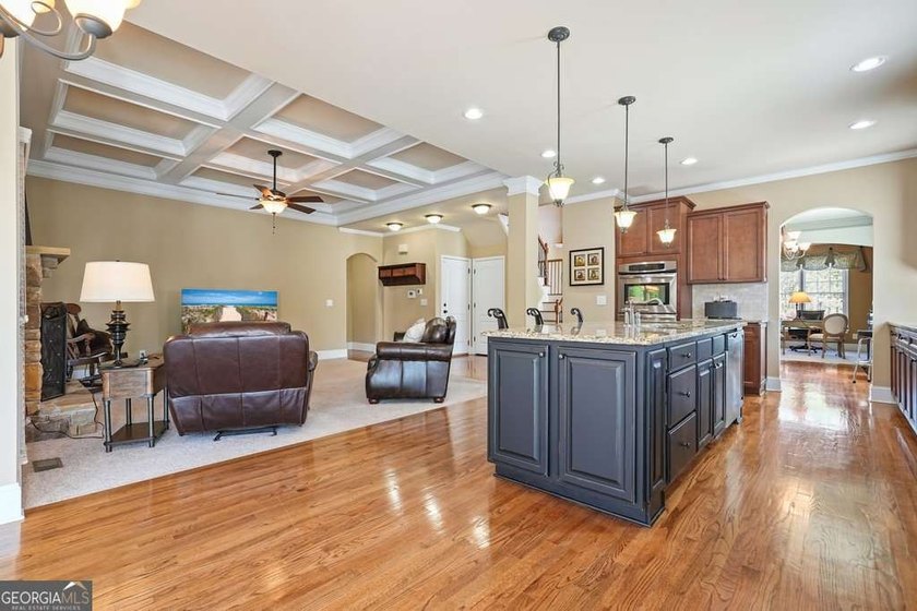Welcome home to this move-in-ready 5BR/4BA custom home in the - photo 7