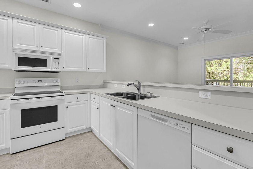 Nestled within the sought-after Retreat at Charleston National - photo 20