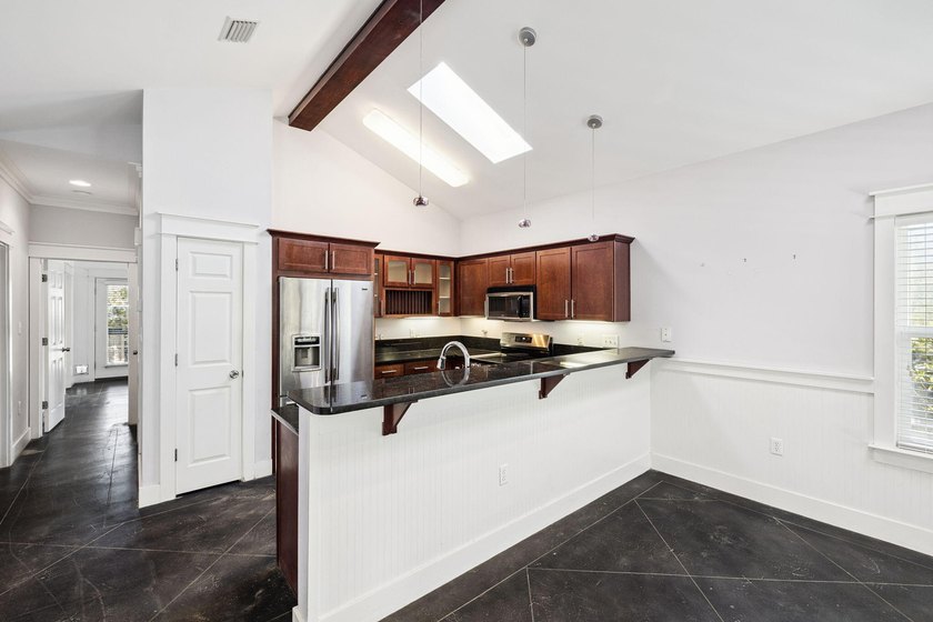 This 3 bedroom, 2 bathroom cottage offers a compelling - photo 7