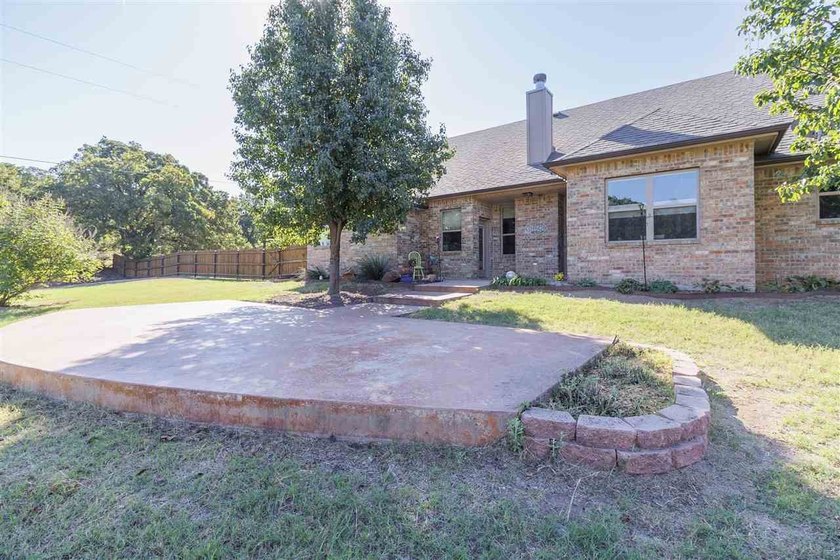This cozy Medicine Park home has it all: Serene views of the - photo 14
