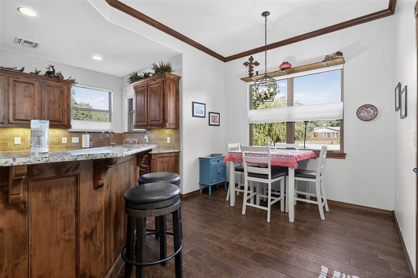 This cozy Medicine Park home has it all: Serene views of the - photo 20