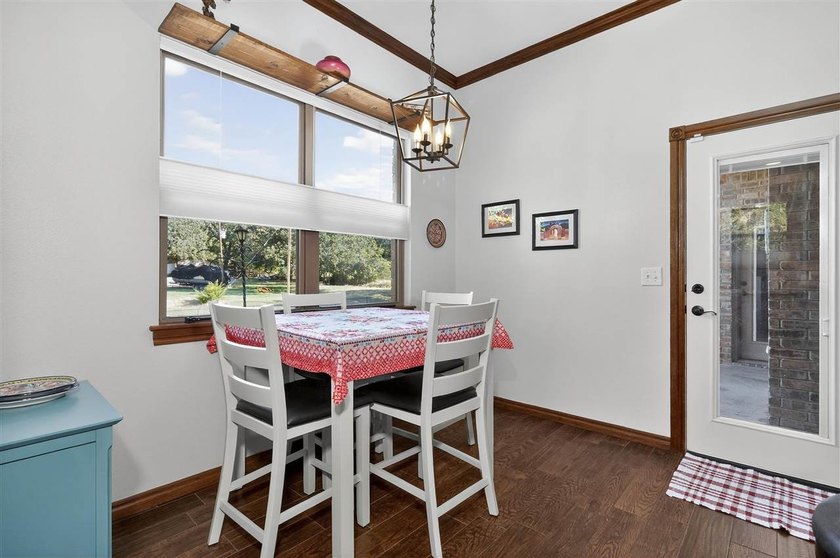 This cozy Medicine Park home has it all: Serene views of the - photo 23