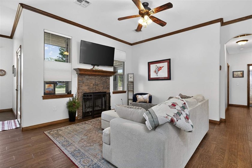 This cozy Medicine Park home has it all: Serene views of the - photo 27