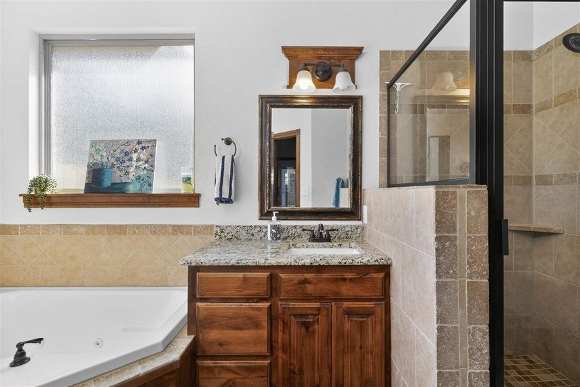 This cozy Medicine Park home has it all: Serene views of the - photo 35