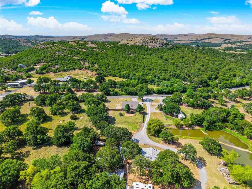 This cozy Medicine Park home has it all: Serene views of the - photo 46