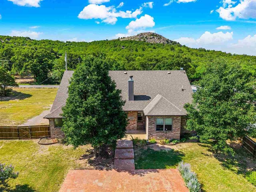 This cozy Medicine Park home has it all: Serene views of the - photo 47