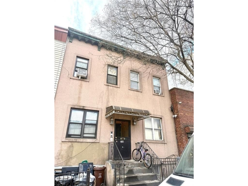Great Opportunity to own this 4 Family House in the Heart of - photo 2