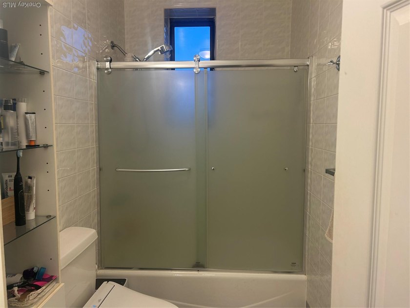 Mint Condition 2 Bedroom, 1 Bath Condo with Ocean Views! - photo 17