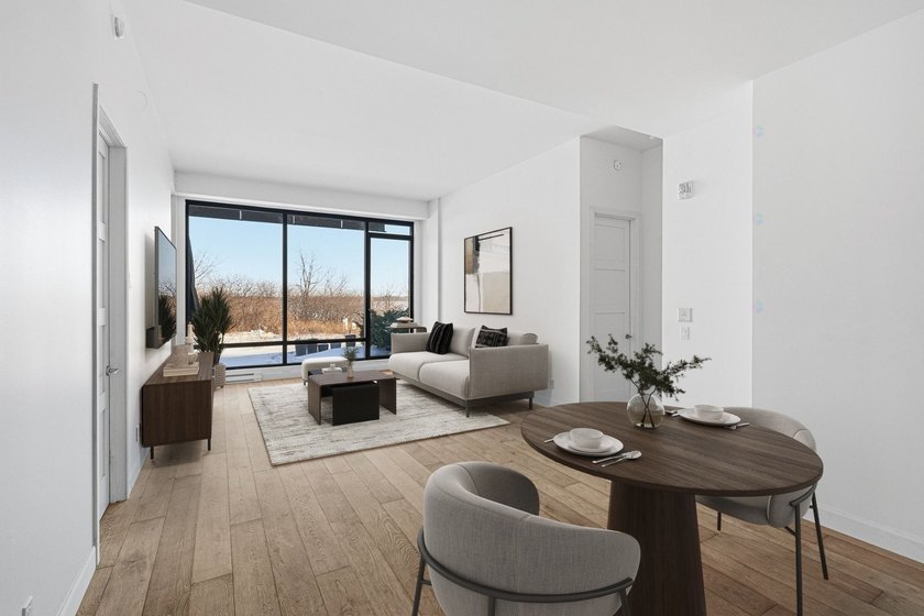 Located in the prestigious EVOLO project on Ile-des-Soeurs, this - photo 4