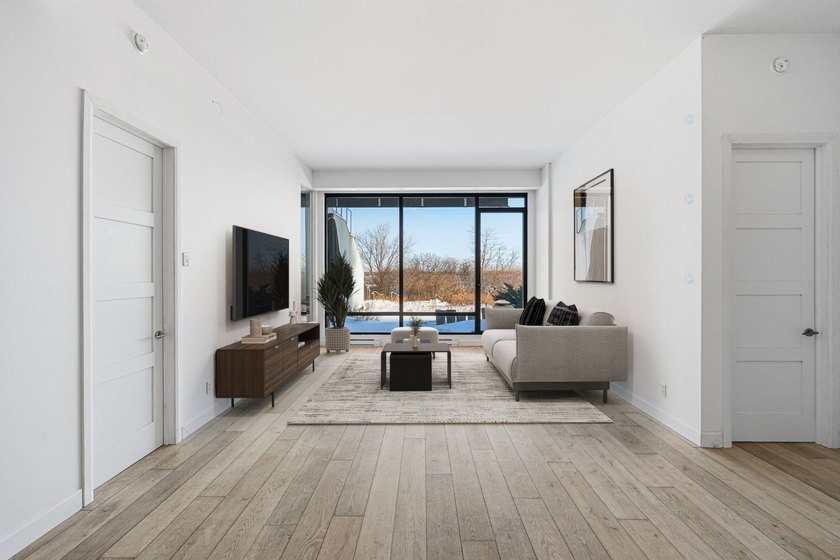 Located in the prestigious EVOLO project on Ile-des-Soeurs, this - photo 6