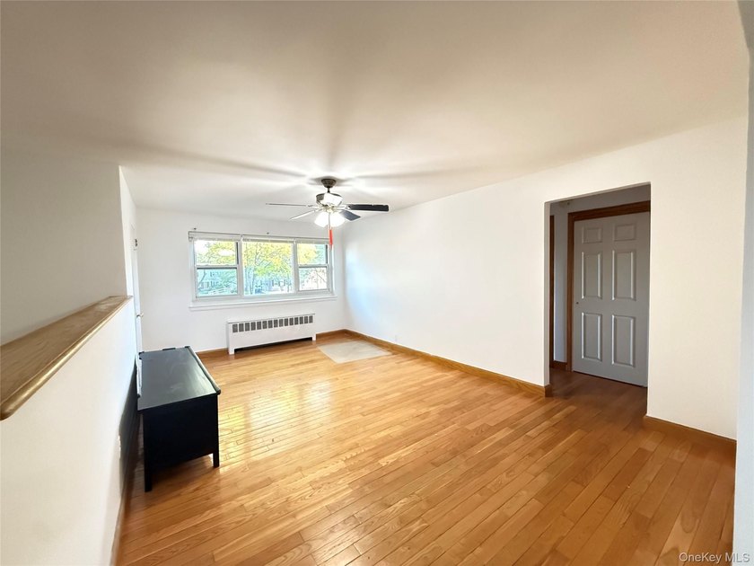 Move right into a SOUTH-facing, fully renovated, spacious, and - photo 3