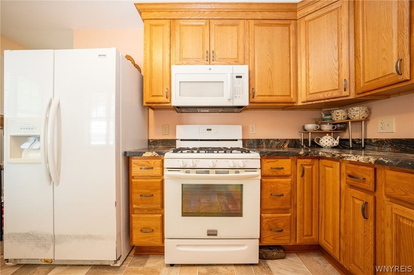 Welcome home to this charming Cape Cod nestled in the heart of - photo 9