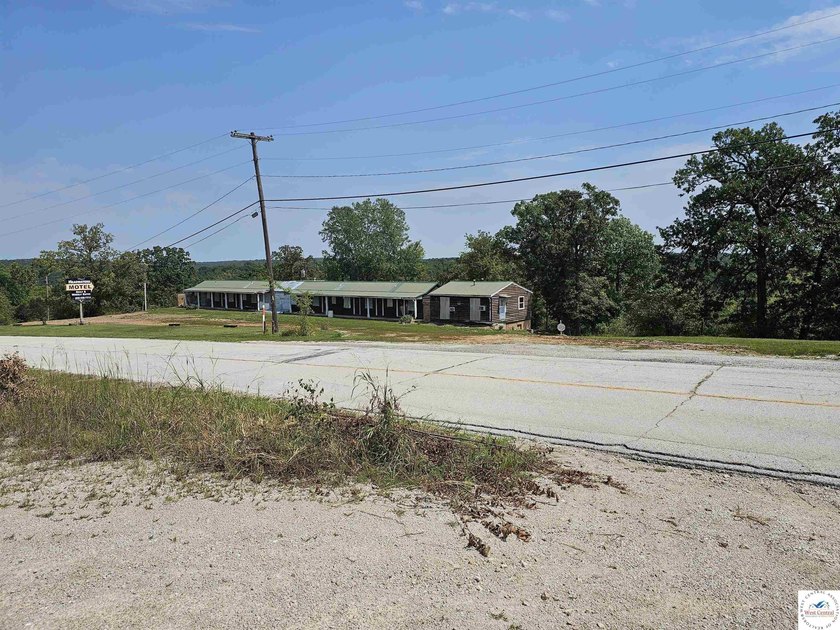 Formerly a 16-room motel with one 24 x 24 cabin. Owner has - photo 5