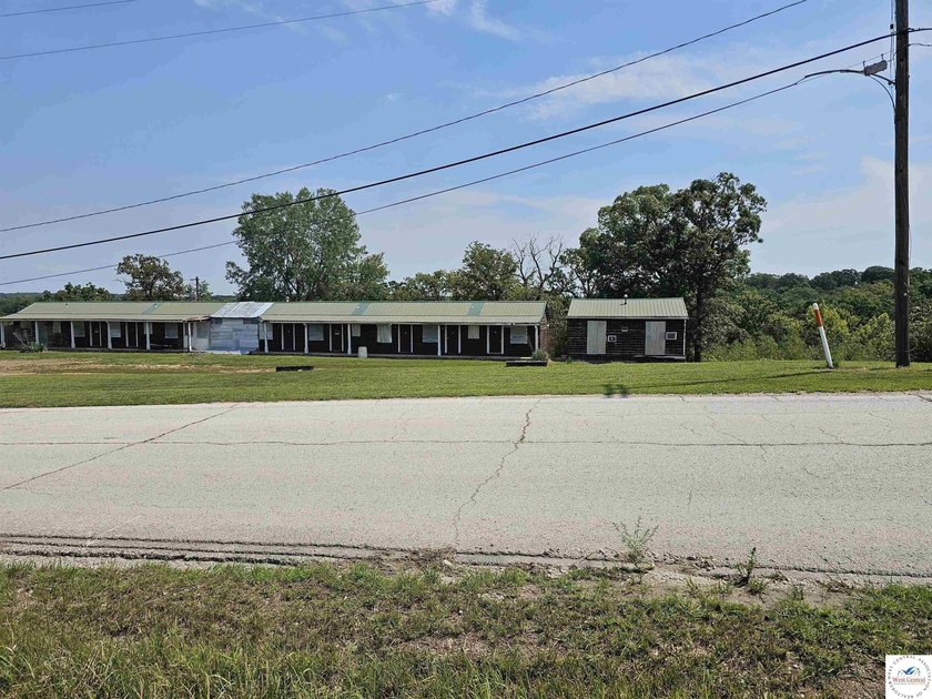 Formerly a 16-room motel with one 24 x 24 cabin. Owner has - photo 7