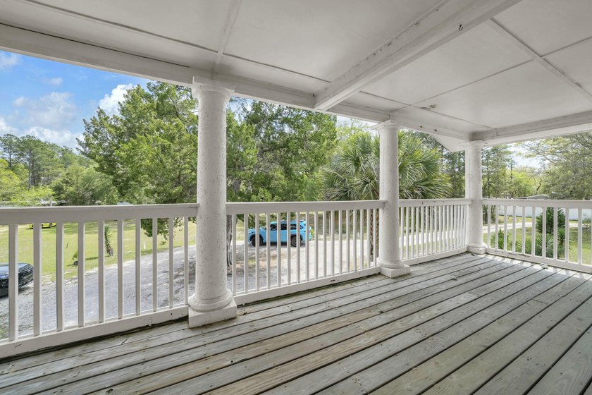 Set on 4.63 cleared acres along a paved county road, this unique - photo 26