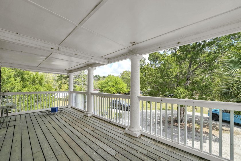 Set on 4.63 cleared acres along a paved county road, this unique - photo 29