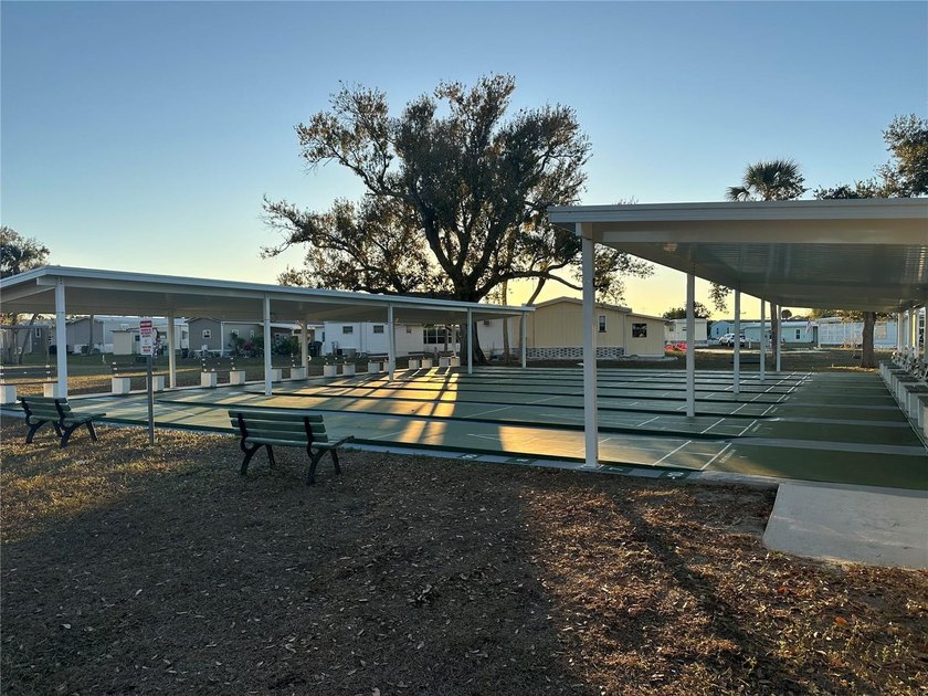 Welcome to Holiday Park! This turn-key furnished LAND-OWNED - photo 40
