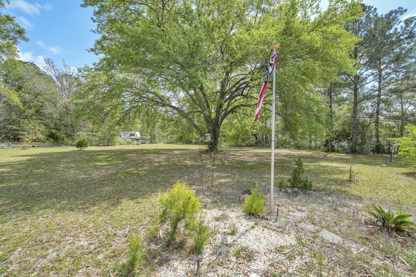 Set on 4.63 cleared acres along a paved county road, this unique - photo 41