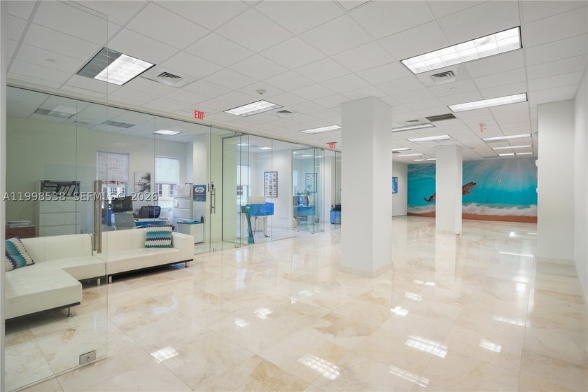 Your riverfront HQ. Own 4,340 SF of bright, efficient workspace - photo 9