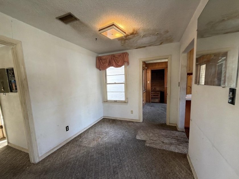 Located just a few miles from the bustling down town area and - photo 6