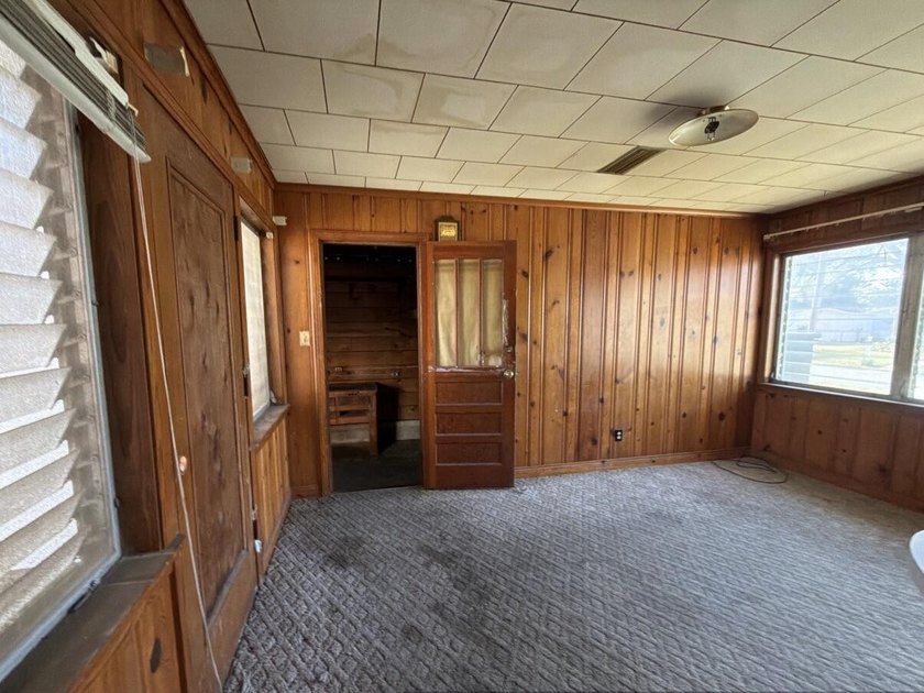 Located just a few miles from the bustling down town area and - photo 9