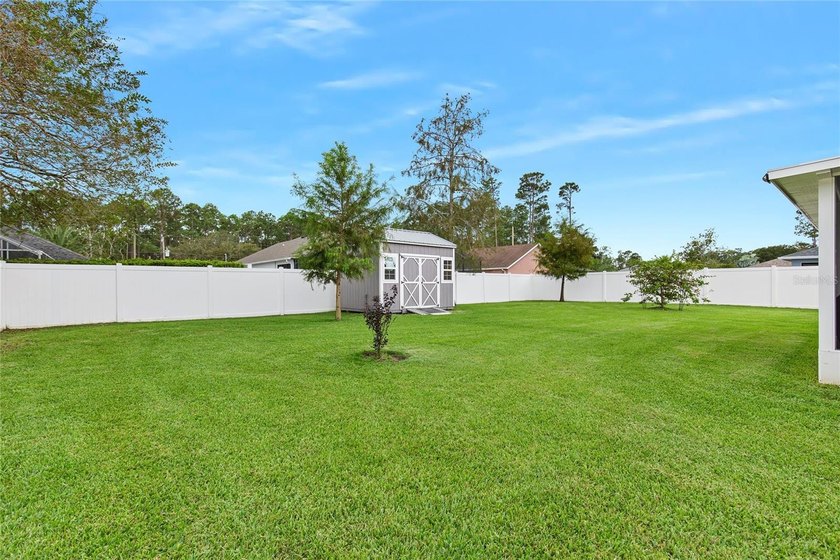 Welcome to this beautifully maintained 3-bedroom, 2-bath home in - photo 29