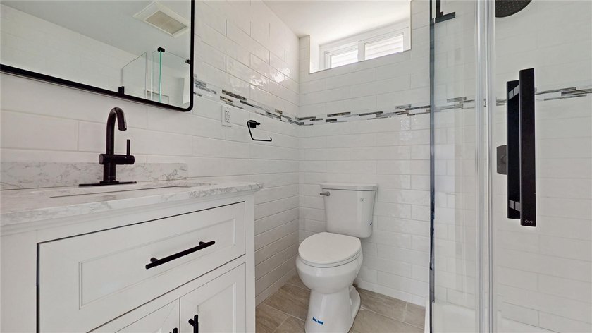 SHOWING BY APPOINTMENT ONLY CALL THE LISTING AGENT 987 E 42nd St - photo 38