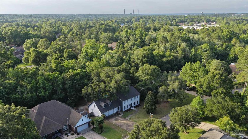Assumable loan available! Beautifully updated 5BR/3BA creekside - photo 50