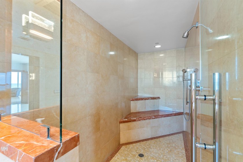 Ideally positioned in the building's premier oceanfront stack - photo 21