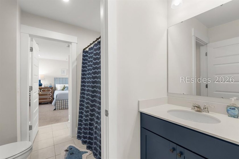 Stunning 5 bedroom, 4 bath lagoon front home designed for both - photo 21