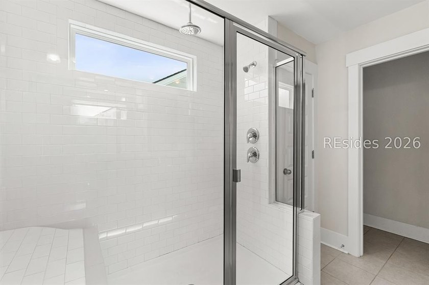 Stunning 5 bedroom, 4 bath lagoon front home designed for both - photo 28