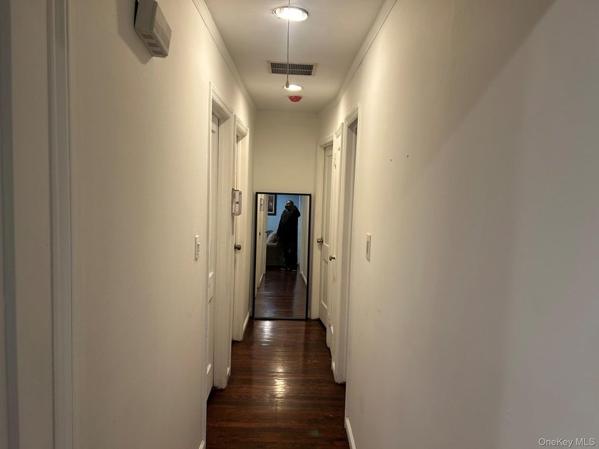 The home features a large driveway, a two-car garage, stainless - photo 10