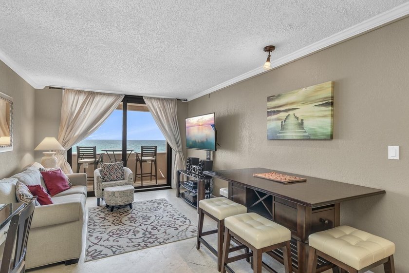 Jetty East is a Gulf front Gated 6-story midrise with under - photo 7