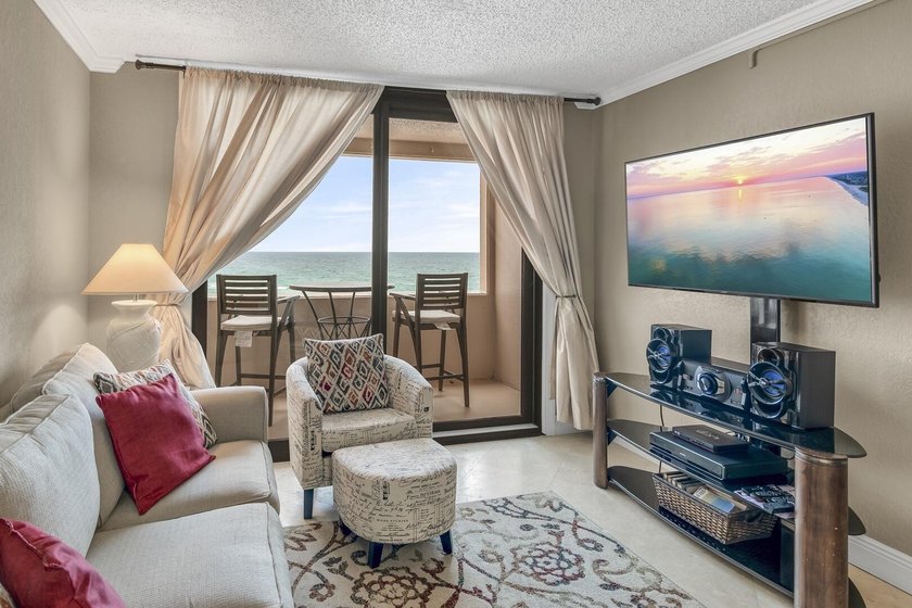 Jetty East is a Gulf front Gated 6-story midrise with under - photo 9