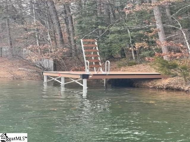 Stunning 6+ acre with new dock lot in the gated community of - photo 3