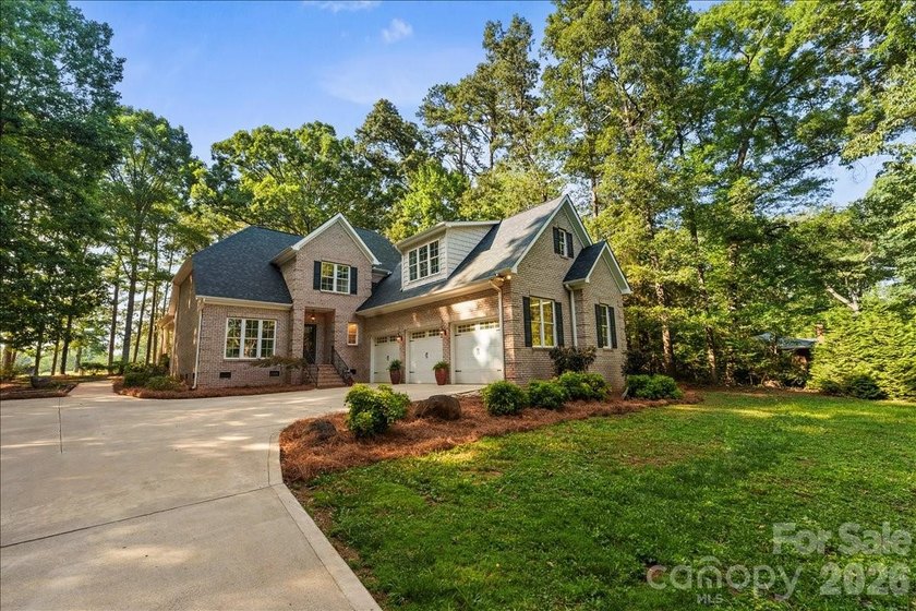 This quality constructed brick custom home boarders Piney Point - photo 3