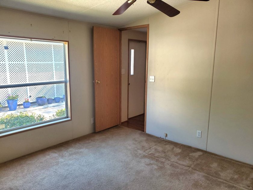 THIS HOME IS ON LEASED LAND WITH A MONTHLY LOT RENT OF $632 AND - photo 50